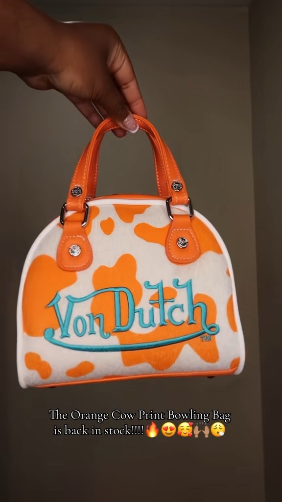 The Viral Orange Cow Print Von Dutch Bowling Bag is back in stock!!🙌🏽😍🧡🩵✨ 

#LTKootd #LTKFestival #LTKgrwm
