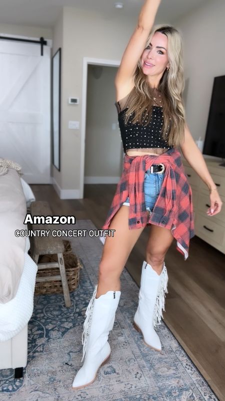 Who’s going to a country concert soon?! 🤠🙋‍♀️  Amazon country concert outfit!!
The flannel is actually a stretchy material that looks like flannel and is so cute! These BOOTS are what fringe dreams are made of!!
Amazon fashion 

#LTKSaleAlert #LTKVideo #LTKFindsUnder50