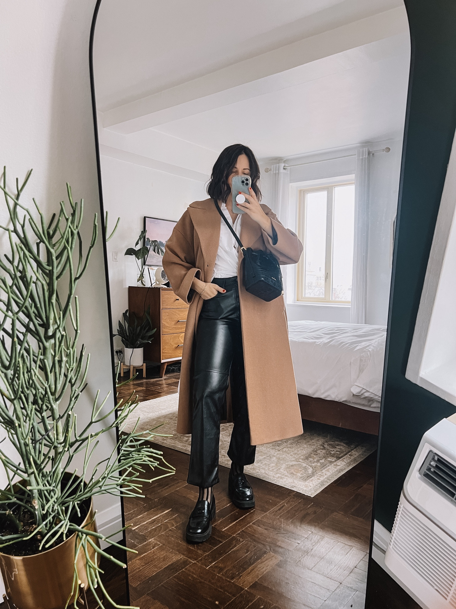 How to style a camel coat. Faux leather pants. Loafers. Sheer socks. Oversized button down 

#LTKMostLoved #LTKfindsunder50 #LTKstyletip