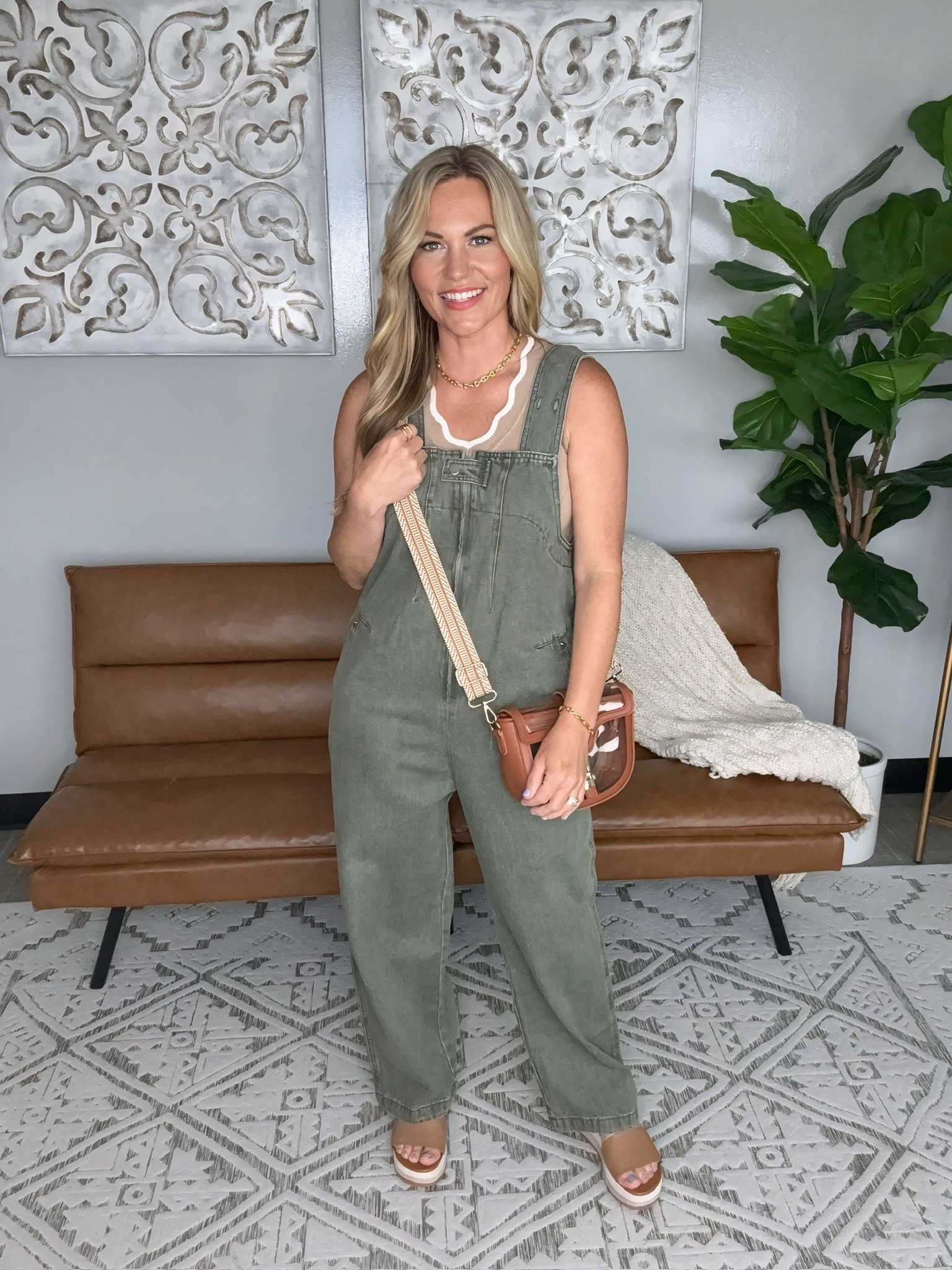 love this jumpsuit styled with the crossbody bag! It gives that effortless, laid back look while still feeling put together. The relaxed fit is comfortable, flattering, and easy to dress up or down depending on where the day takes you.

olive jumpsuit, casual chic, crossbody bag, everyday outfit, comfortable fashion, weekend style, effortless outfit, one piece look, summer wardrobe, easy style, audriedollins

#LTKTravel #LTKOver40 #LTKSeasonal