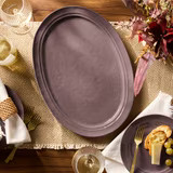An oval plum stoneware serving platter