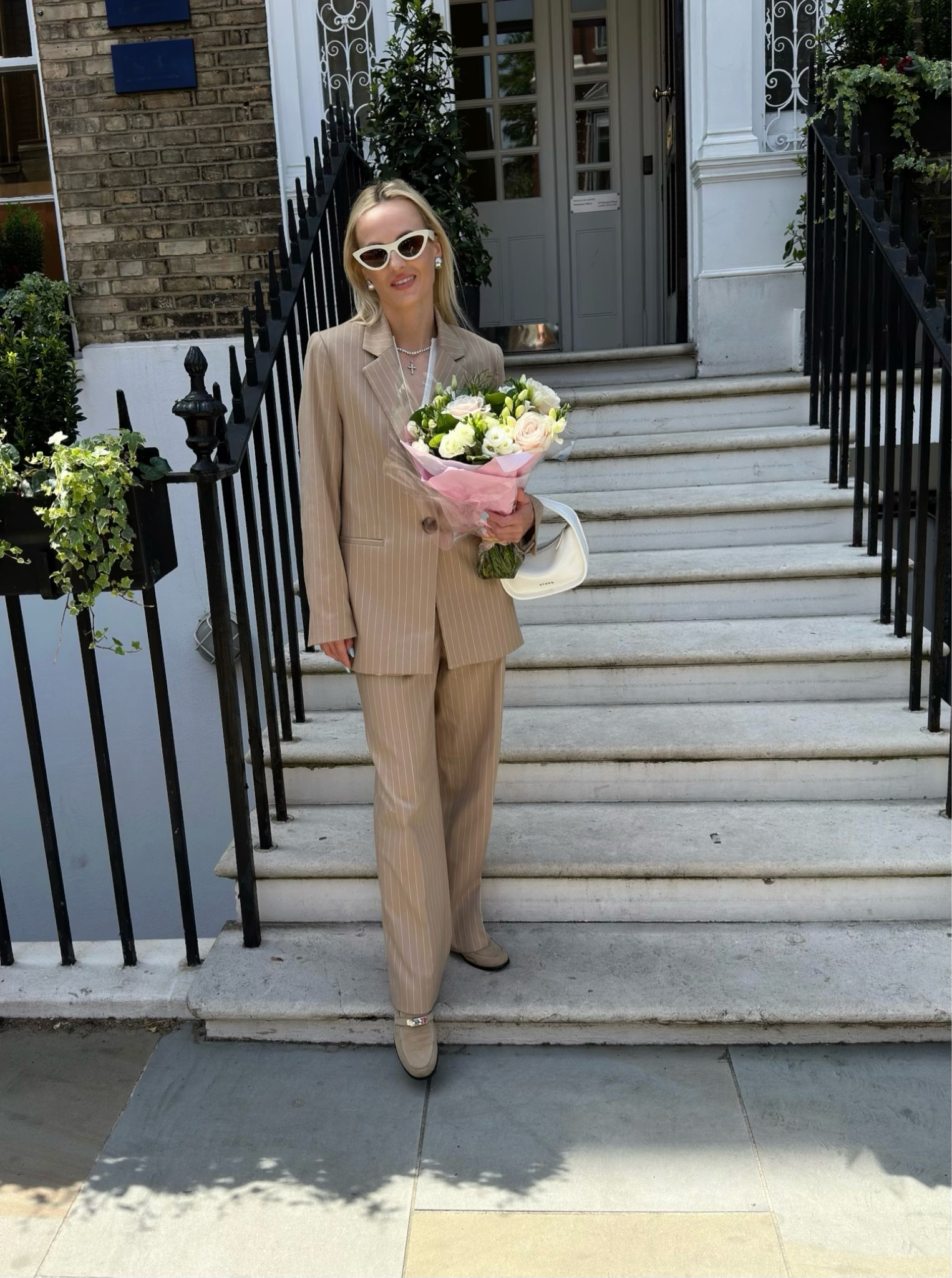 Beige pinstripe suit look !!

Monochromatic beige attire accompanied with white detail accessories for sunny summer days perfect for work or business meeting too.

Revolve cat eye sunglasses, Mango round stud earrings, Zara white top and beige pinstripe suit, Swarovski crystal tennis necklace, Staud white patent bag, Hermés Destin beige loafers.

#LTKspring #LTKsummer #LTKeurope