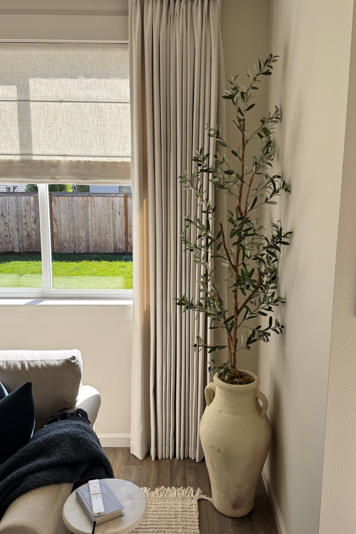 Faux tree, Olive tree, on sale, large ceramic pot, custom curtains, throw pillows, throw blanket, neutral home, pops of blue! 

#LTKItBag #LTKHome #LTKU