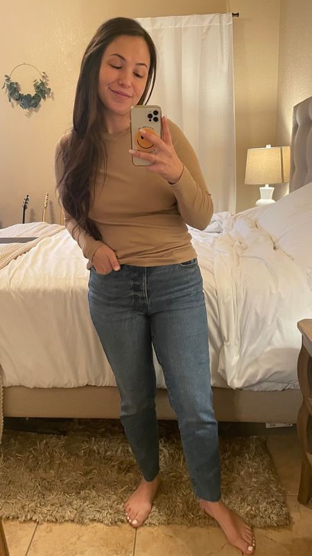 Mom uniform as of lately✨ 

Basic long sleeve tee shirt size down, it’s fitted but lots of stretch. Wearing size Small. Jeans are size 6 Short, and perfect length. I’m 5’2” and 140 lbs for reference. 

So many color options and washes on the denim at great prices! 🎯

Basics | Womens Clothing | Denim

#LTKstyletip #LTKSeasonal #LTKMostLoved