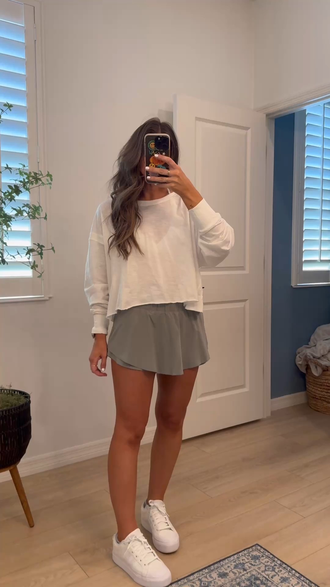Tts small everything. I wore this skort soooo much last summer and fall! I have multiple colors. It’s the BEST!!!!!! I lived in it for mom life hanging out with the girls, running errands and to Disney and Legoland a lot too :) // and how cute is the back on this top???