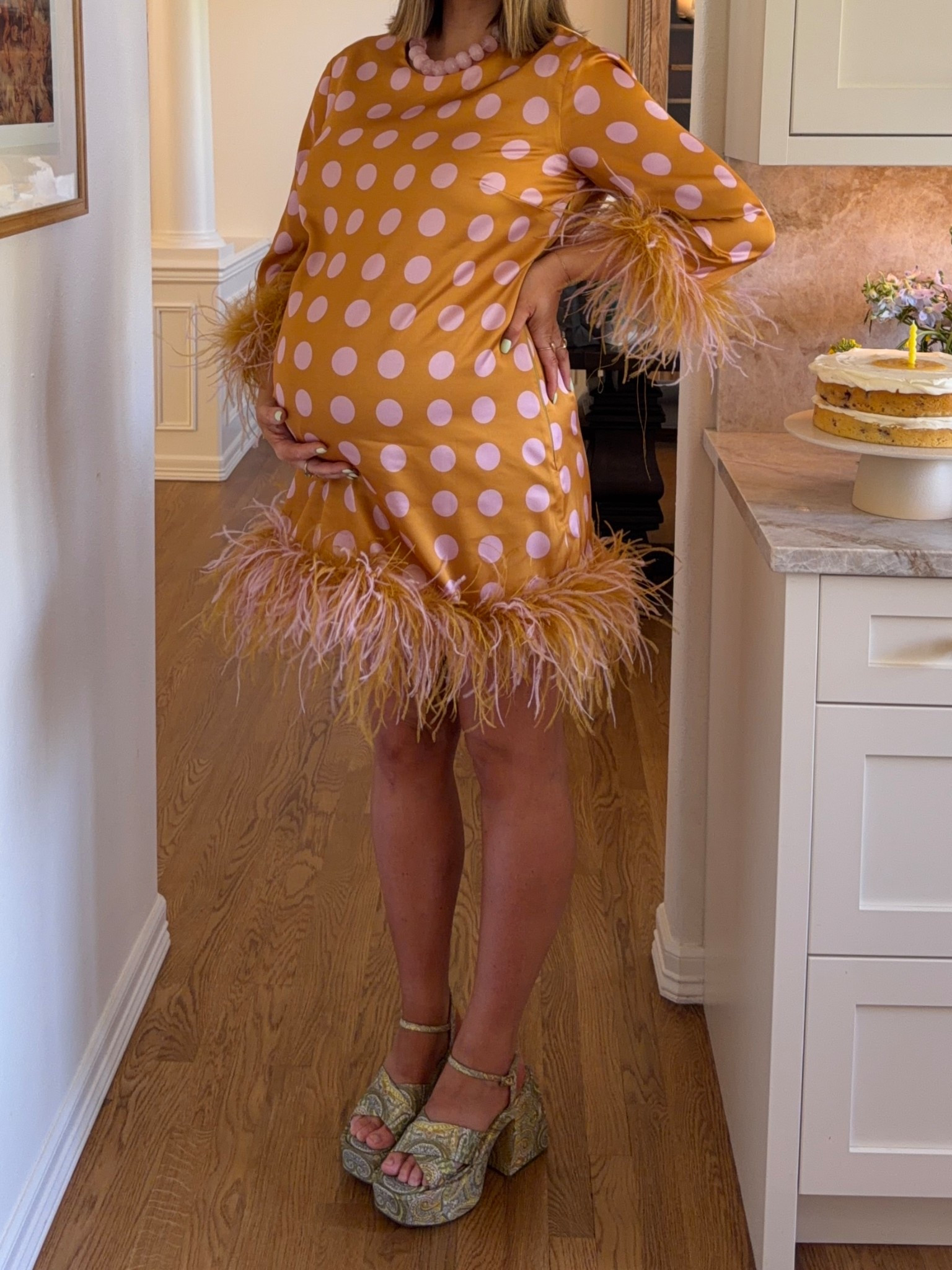 Size 10 in this polka dot feather dress (obsessed!!) I would take an 8 if I want pregnant. It has great length too I’m 5’ 5” and it’s mid to low thigh. Comfortable and so cute!! Platforms are amazing actually very easy to walk in and comfy. True to size! 

#featherdress #babyshowerdress #bresheppard #thirdtrimester #playformheels #polkadots #birthdaydress