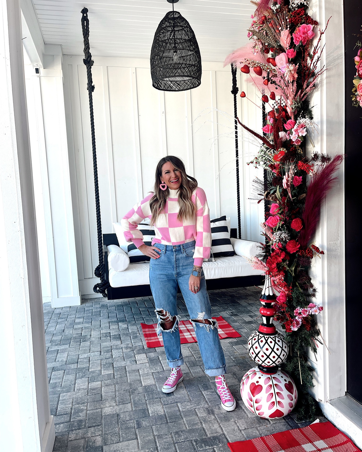 In a small pink checkered sweater, sequin boots and heart earrings from Amazon & size 28 Agolde jeans for Valentine’s day - all fits TTS.

#LTKSeasonal #LTKshoecrush #LTKstyletip
