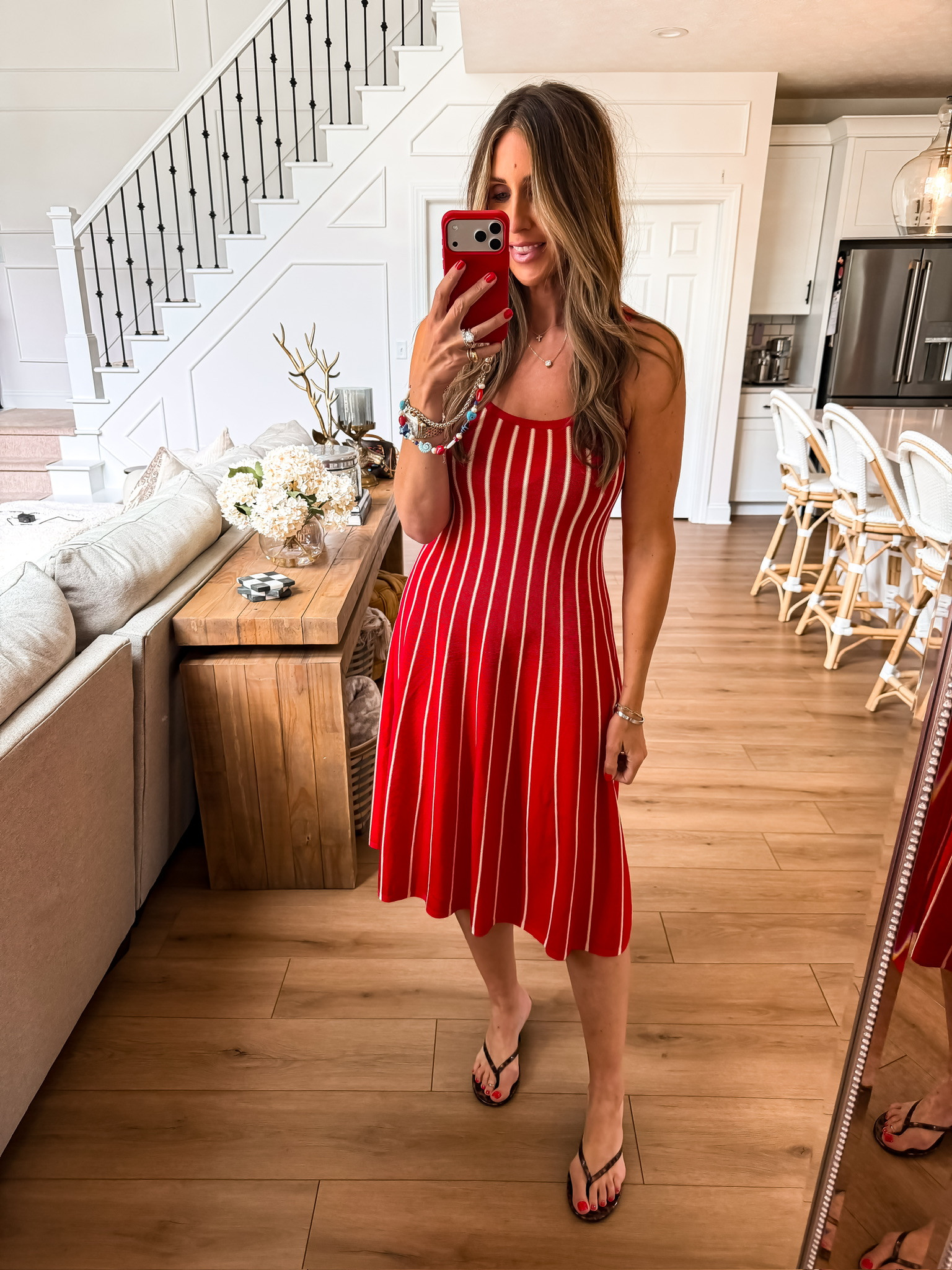 This red striped midi dress is such a chic summer outfit for everything from vacation dinners to holiday celebrations. The flattering fit-and-flare silhouette and classic red and white stripe pattern make it an easy piece to dress up with heels or keep casual with sandals.

themominstyle, red midi dress, striped summer dress, summer vacation outfit, Fourth of July outfit, patriotic outfit, fit and flare dress, vacation dinner outfit, casual summer style, red and white dress, summer fashion finds, midi dress outfit

#LTKSeasonal #LTKTravel #LTKootd