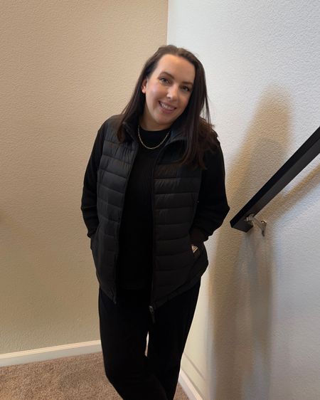 Staying warm in this packable puffer vest all winter / winter work from home outfit / all black outfit / Amazon fashion

#LTKSeasonal #LTKfindsunder50 #LTKworkwear