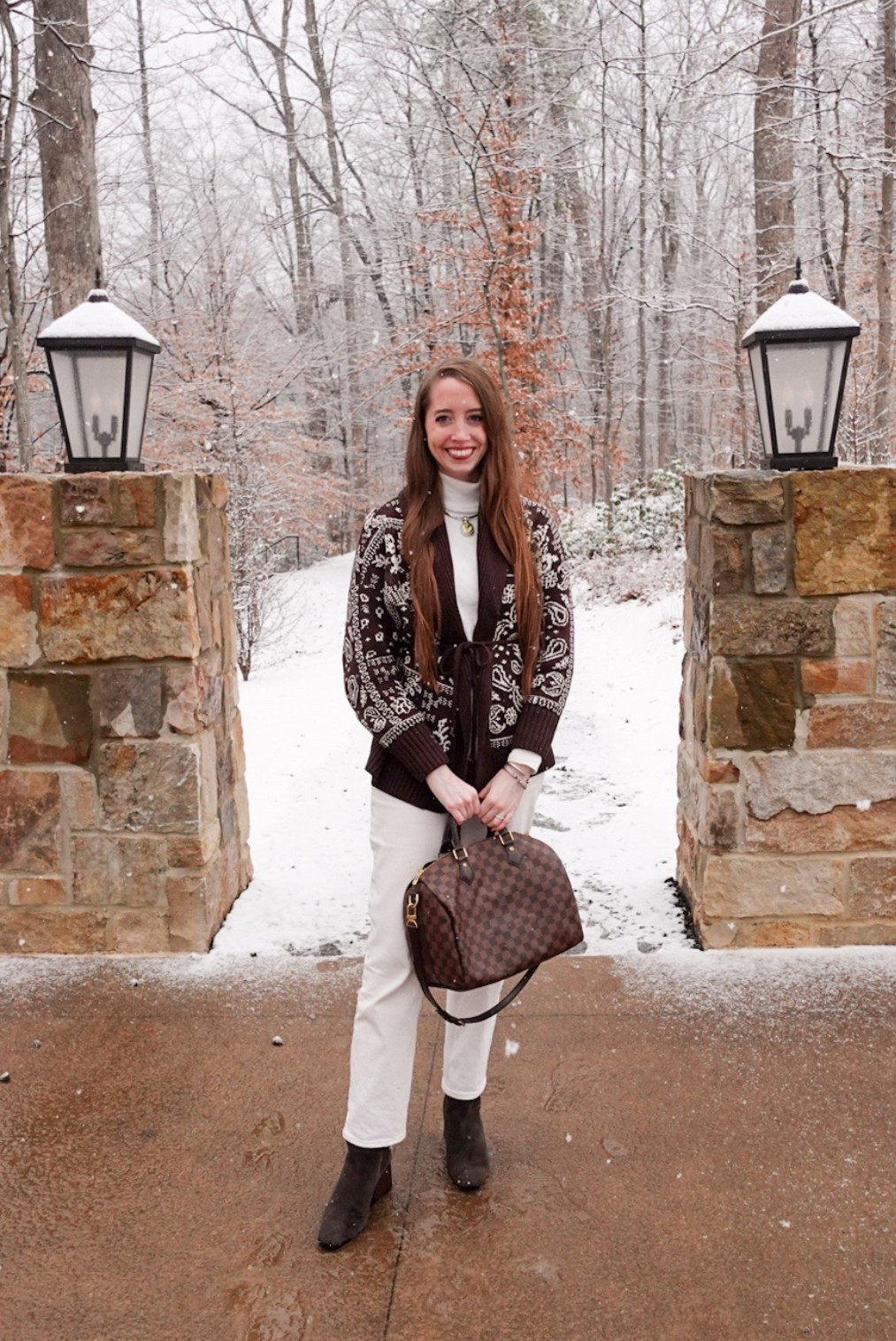 My favorite casual outfit this winter! My bandana print sweater is on sale and true to size - also linking a similar one with fringe 😍

White straight jeans 
Chocolate brown booties 

#LTKSaleAlert #LTKSeasonal