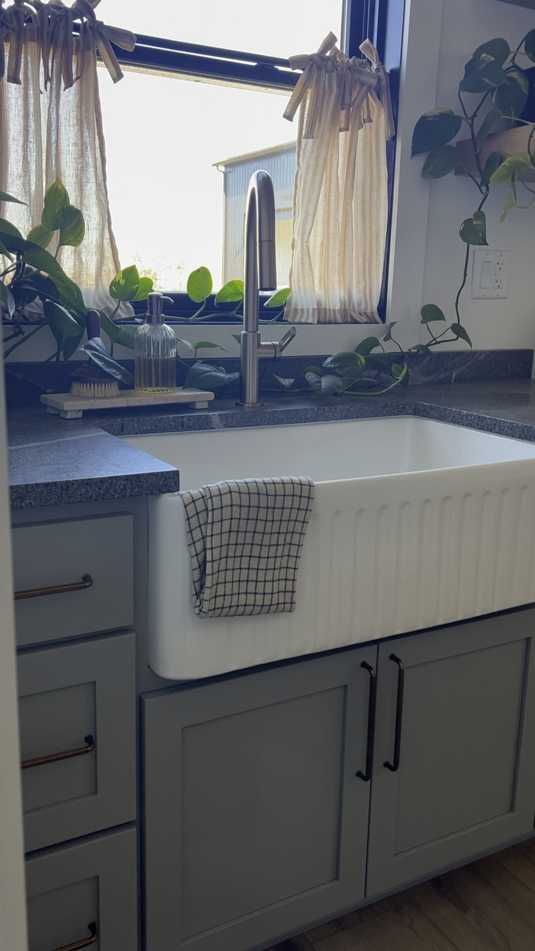 Added some cafe curtains for privacy - but the fluted sink still steals the show 🤍

#LTKVideo #LTKHome #LTKStyleTip