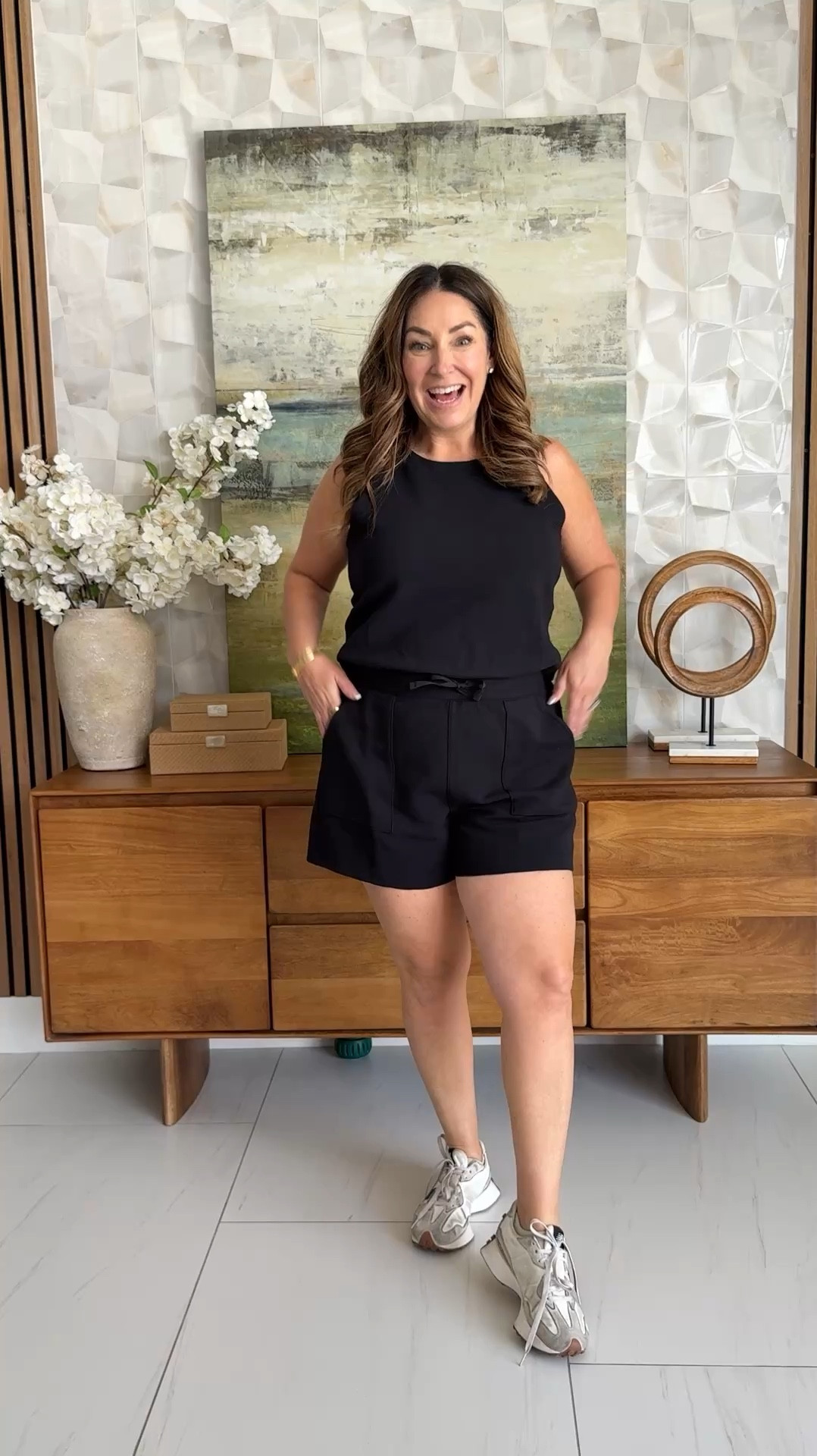 Your new go-to summer romper 🖤 This new @spanx is a wardrobe staple — relaxed fit, super soft fabric, and the drawstring waist is so flattering. plus the back splits for easy potty breaks! 

Wearing a large 
5'5 / size 12 for reference

#summerset #casualoutfit #spanxpartner  

 #LTKSeasonal #LTKOver40 #LTKMidsize