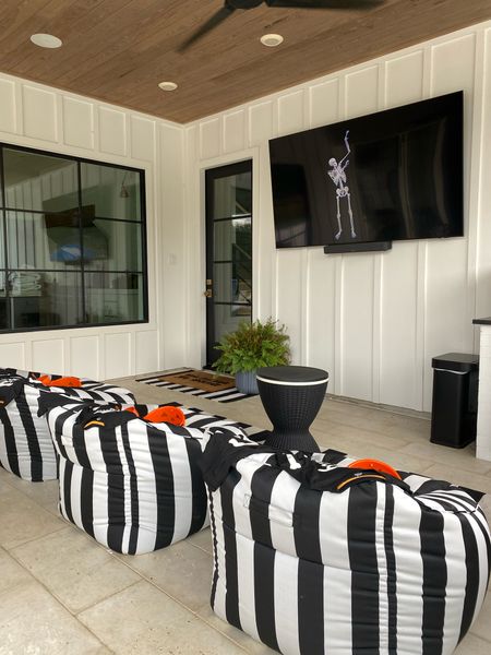 I hosted an outdoor family movie night and it started a family tradition for us! These outdoor bean bag chairs are so comfortable! I filled them with matching family pajamas, light up popcorn buckets and drink tumblers! 

Outdoor furniture/ patio furniture/ movie night / family time / frame tv / cooler / Halloween / Halloween decor 

#LTKHoliday #LTKfamily #LTKHalloween