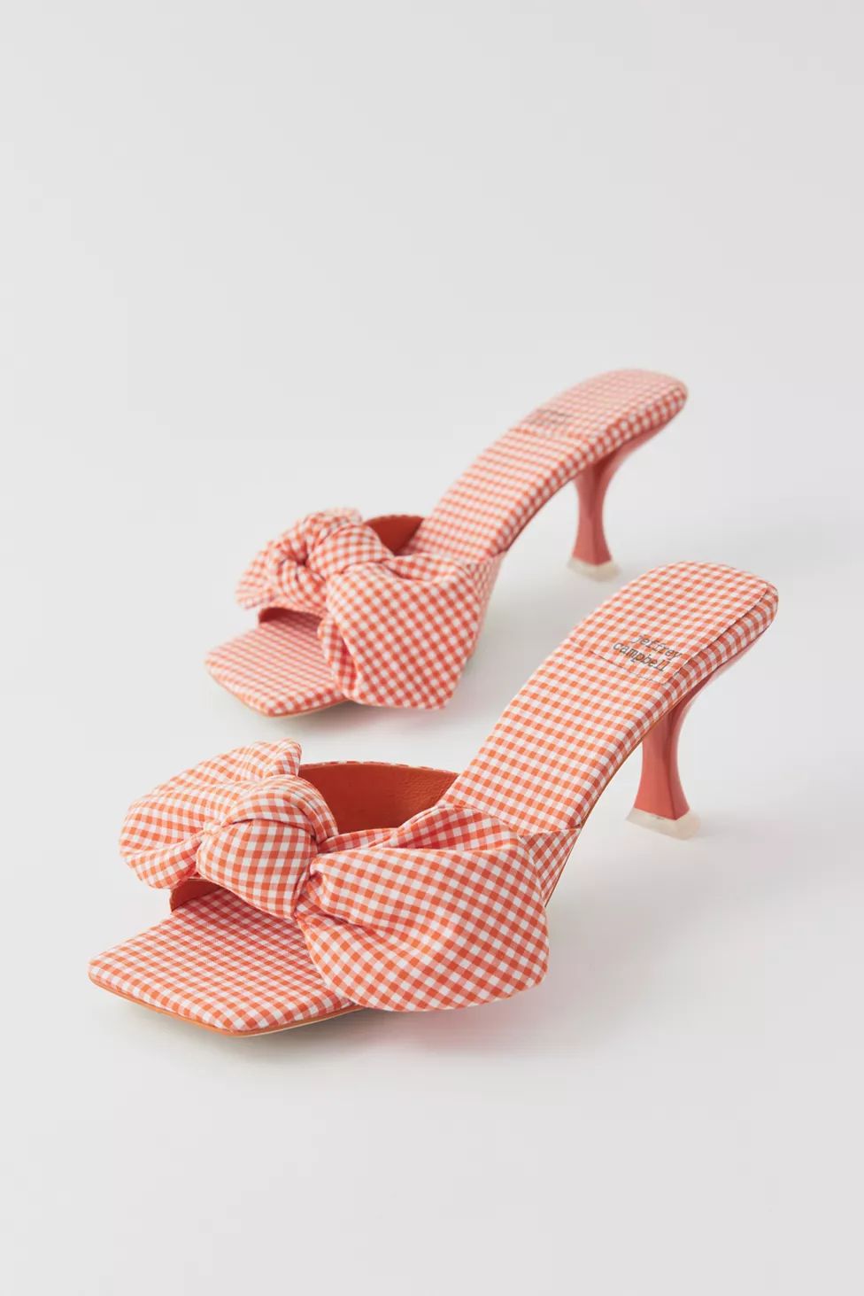 You May Also Like

               
            Jeffrey Campbell Ensue Gingham Heeled Mule
       ... | Urban Outfitters (US and RoW)