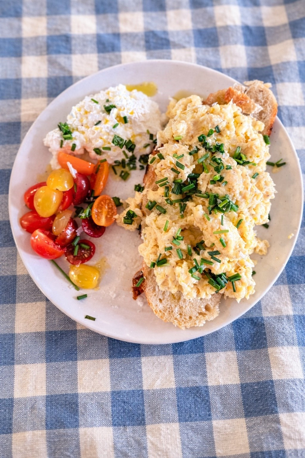I focus on getting my protein in every day — and I start at breakfast— but not in a boring way.

This simple breakfast comes in around 500 calories with almost 40g of protein and keeps me satisfied for hours.

2 whole eggs + 2 whites
½ cup 4% cottage cheese (or tangy goat cheese)
1 slice sourdough
Cherry tomatoes
Drizzle of EVOO + Maldon salt

Linking my favorite sourdough tools, olive oil, Maldon salt, and everyday kitchen staples 🤍

Healthy and flavorful can absolutely live on the same plate.

#LTKHome #LTKfoodie #LTKfitnessgoals