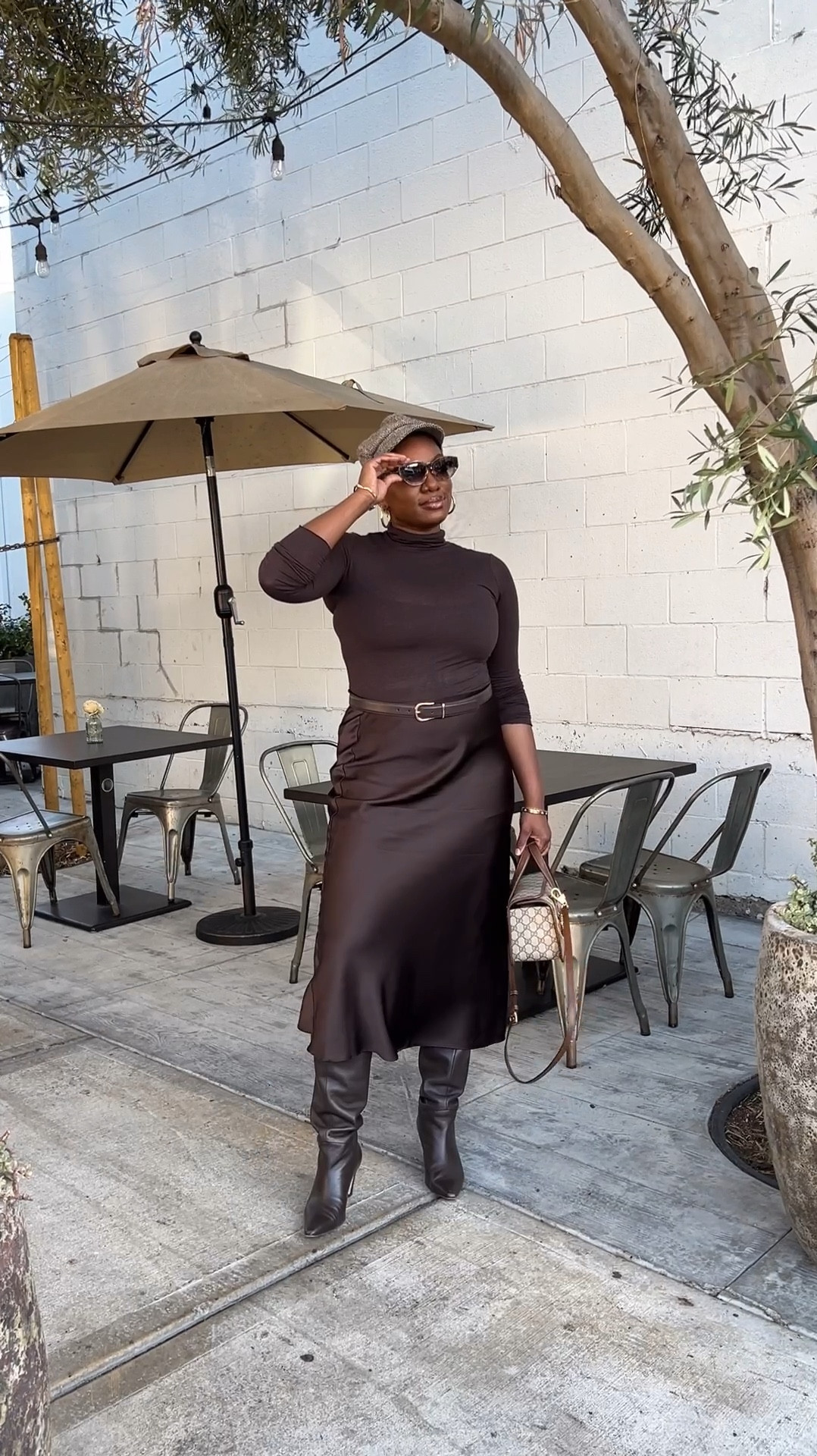 Brown is the new black 😉

Intimissimi Cashmere Turtleneck 
Zara Satin Skirt (linking similar options below(
Everlane Banana Heel Boots
Vince Camuto Newsboy Hat
Dezi Sunglasses
Gucci Purse