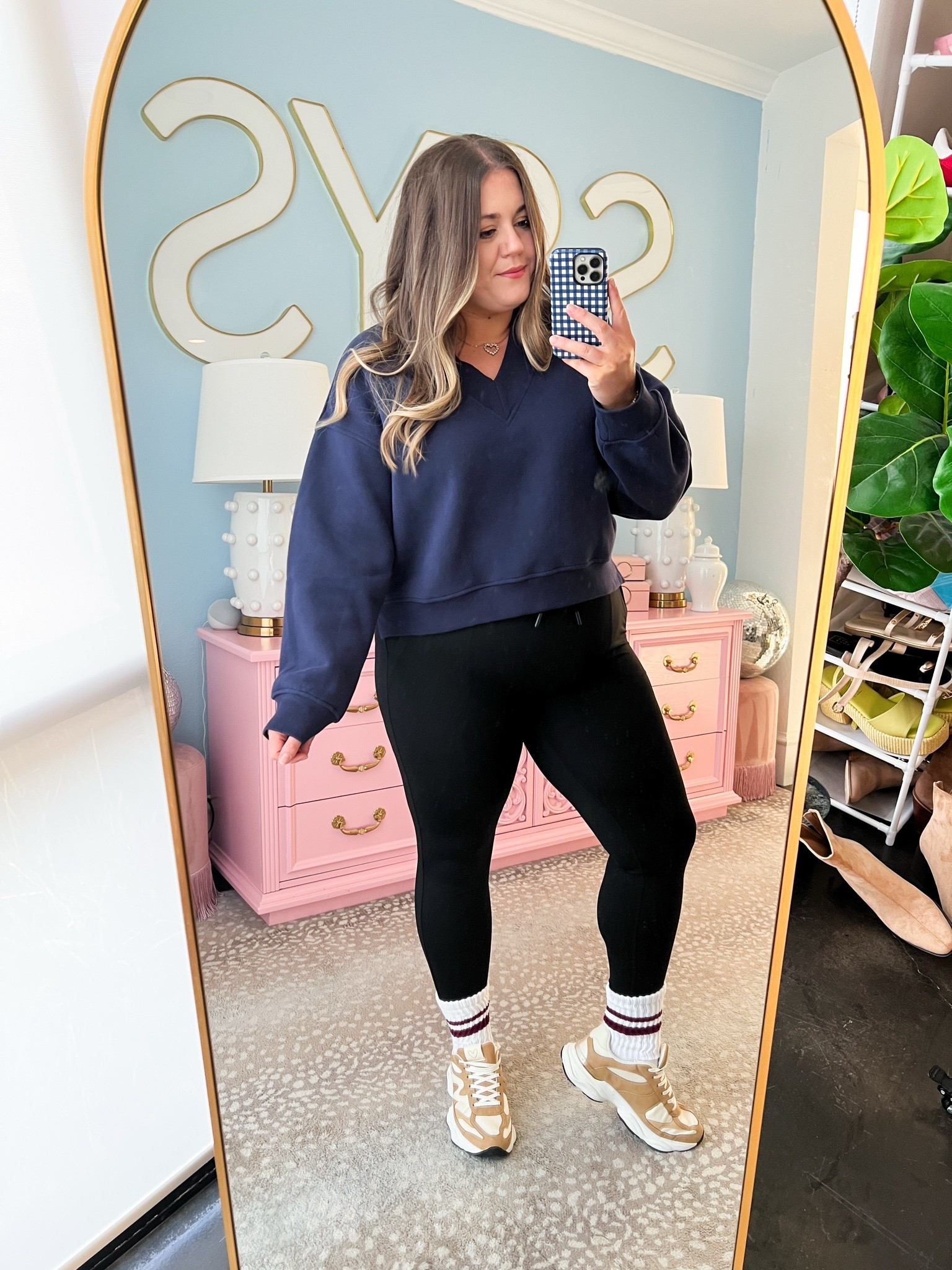 Love the idea of a v-neck sweatshirt! Definitely more flattering for rounder faces like mine. This pullover comes in a ton of colors! I’m wearing an XXL in the sweatshirt and leggings.

#LTKootd #LTKfitnessgoals #LTKMidsize