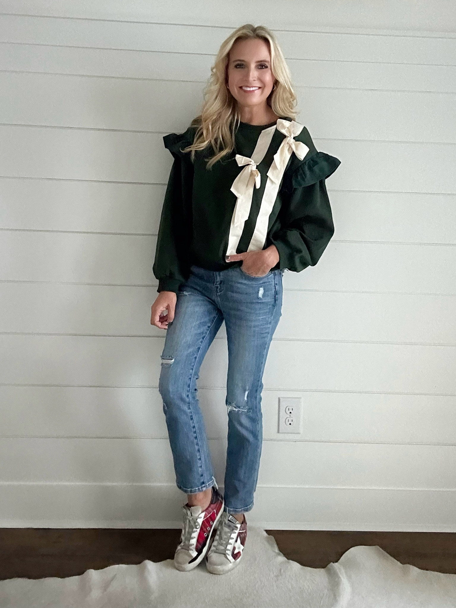 This is the cutest bow sweatshirt! Wearing size small. So fun for the holidays and just everyday! Jeans are a 25. Use code FANCY15 for 15% off sweatshirt  

#LTKStyleTip #LTKSeasonal #LTKHoliday