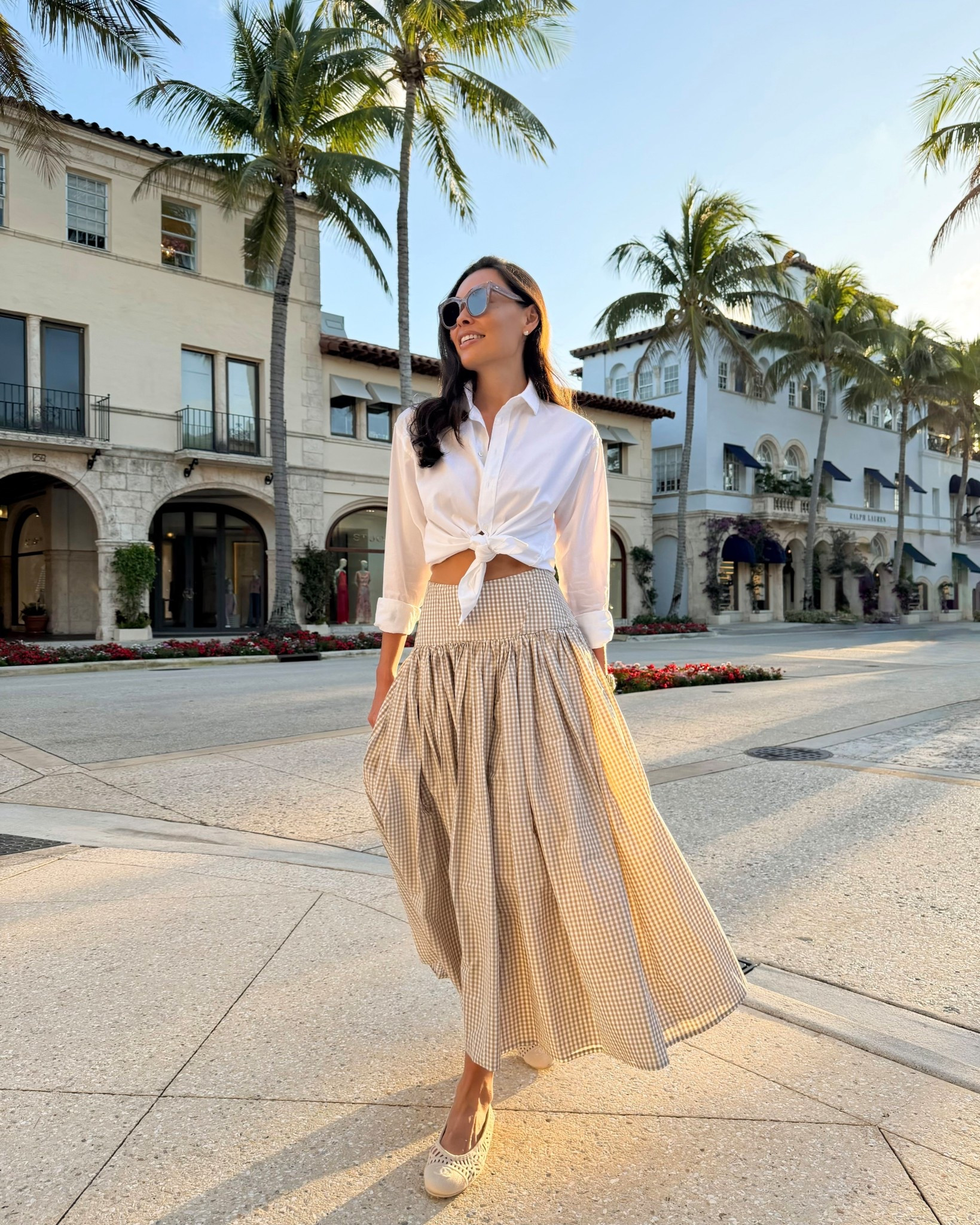 Kat Jamieson wears a gingham skirt in Palm Beach, spring outfit, midi skirt. 

#LTKSeasonal #LTKTravel #LTKWorkwear