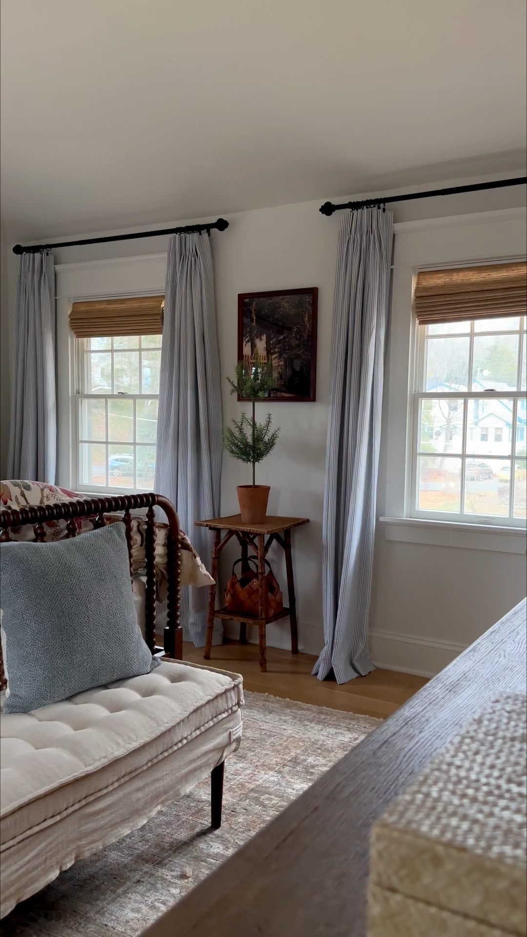 The Art of a Room to Rest | PART III, The Finishing Layers: 

If the foundation sets the tone, the finishing layers create the feeling. This is where function meets softness, and where a room shifts from styled to settled. Every choice matters—not for impact, but for balance.

Start with pieces that earn their place.
Here, a bamboo tortoise table between the windows brings utility and quiet texture. A tufted bench adds comfort and an invitation to pause, with the function of a place to get dressed.

Ground the palette underfoot. A patterned rug anchors the room, holding the colors together and softening the space both visually and physically.

Then, layer the windows fully.
Stripes introduce rhythm and movement.
Woven roman shades add warmth and depth. Together, they frame the light and give the room a sense of completeness.

The final layers shouldn’t shout.
They should support how the room is lived in—calm, functional, and considered.

When each element has intention, rest follows naturally. You can shop my entire space by simply commenting SHOP. Then, check your messages! Plus, use code MEG for an extra 10% off your @selectblinds window treatments order, sitewide! 