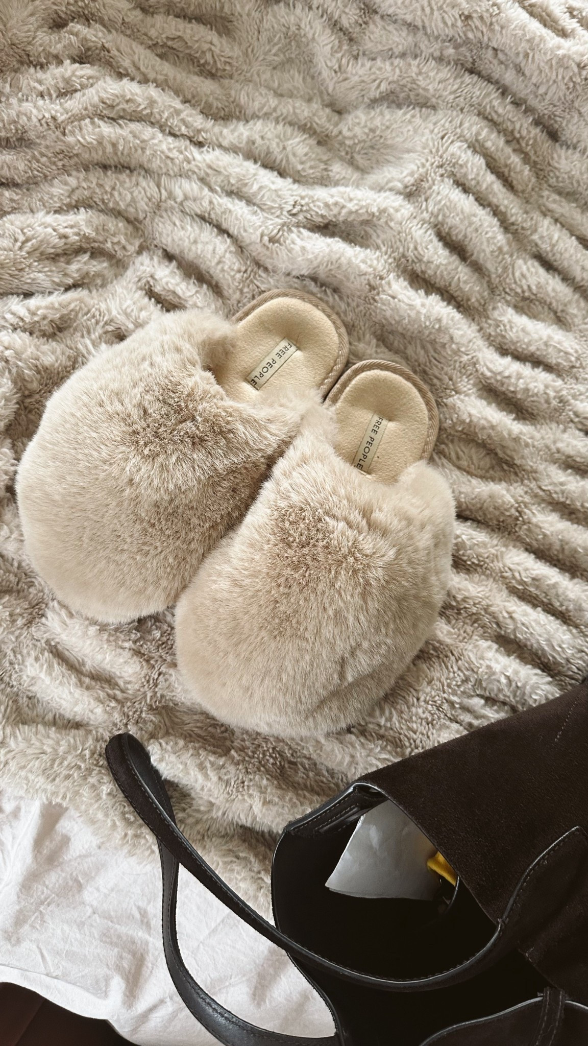 Free people cozy slippers! Under $70 gift idea I’ve been living in 😍

#LTKSeasonal #LTKFindsUnder100 #LTKGiftGuide