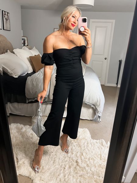 Black jumpsuit from Lulu’s. Fits tts and looks great with a variety of heels. Under $100. Shoes go up 1/2 size and under $60 (crazy comfortable) 

#LTKSeasonal #LTKHoliday #LTKunder100