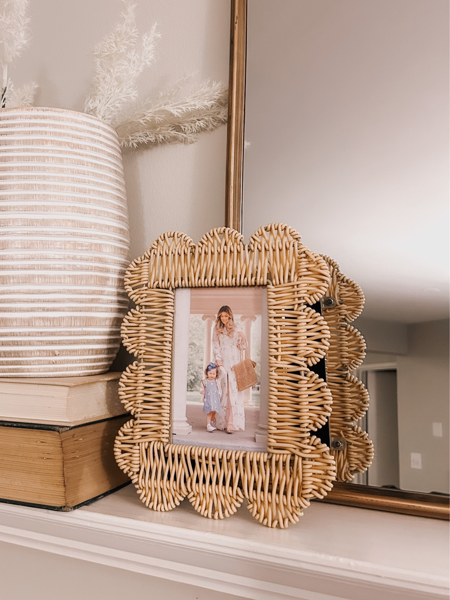 Cutuest rattan picture frame, scalloped edges. Looks like Serena and Lily for a fraction of the cost 

#LTKFind #LTKSeasonal #LTKhome