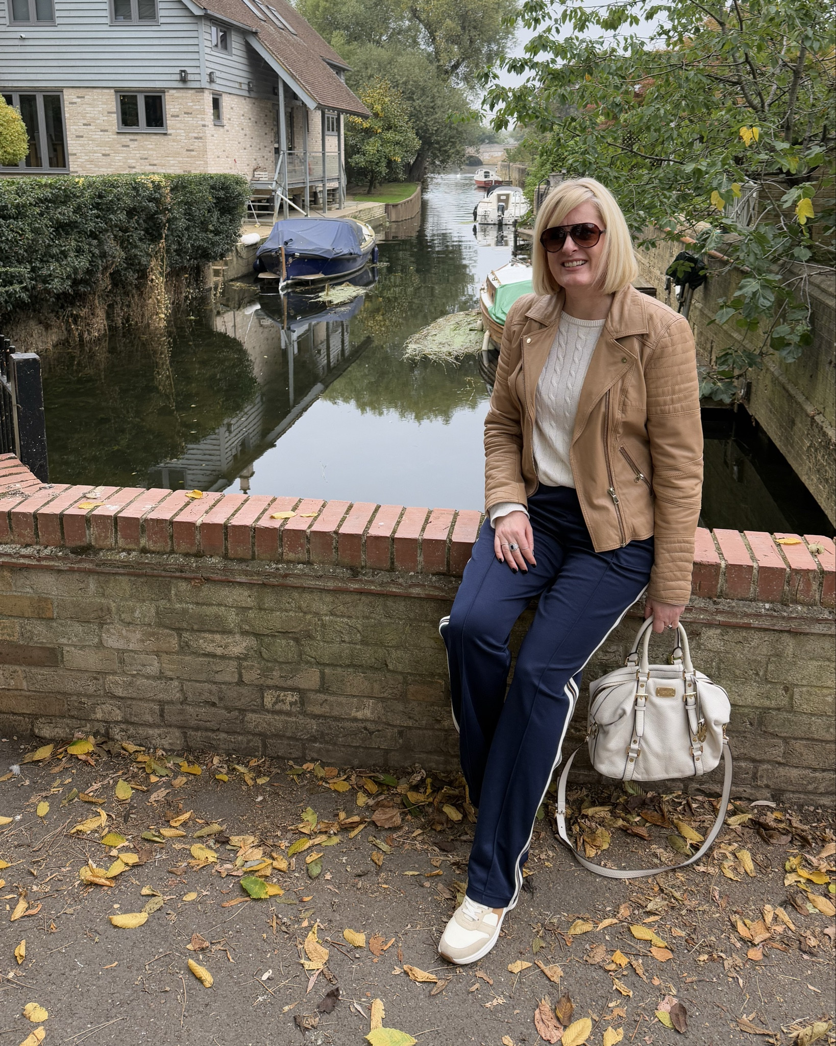 Hi everyone! I’ve been loving my new retro joggers with side stripe. I’m wearing navy but they also come in burgundy (which I also have) &amp; green. I like that they are straight leg &amp; also available in different leg lengths so great for us taller ladies too. They are very good quality &amp; cotton rich  


U.K. blogger, 40 plus, midsize, tall, M&amp;S, marks and Spencer, affordable, high street, casual trousers  


#LTKuk #LTKautumn #LTKstyletip