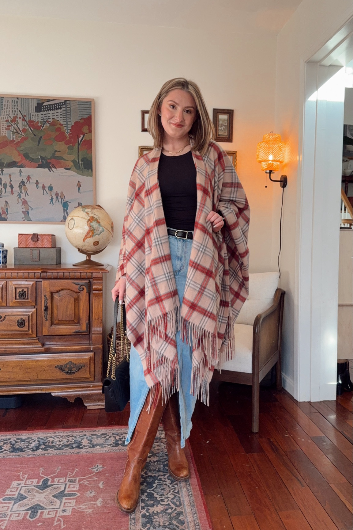 Denim skirt 
Plaid tartan shawl 
Frye boots
Black shirt 


#LTKStyleTip