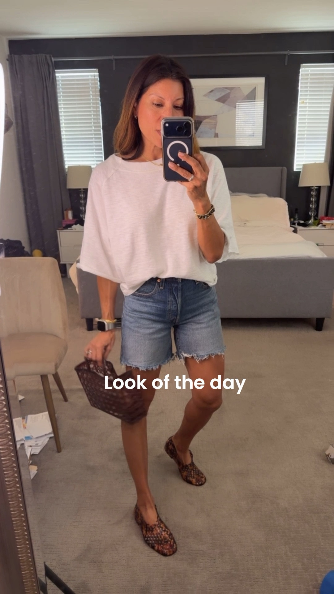 Easy spring outfit. 
Denim shorts @levi in mid length 
size 26 for a more relaxed fit 

Shoes fit tts 
Top xs 

#LTKOver40 #LTKSeasonal #LTKootd