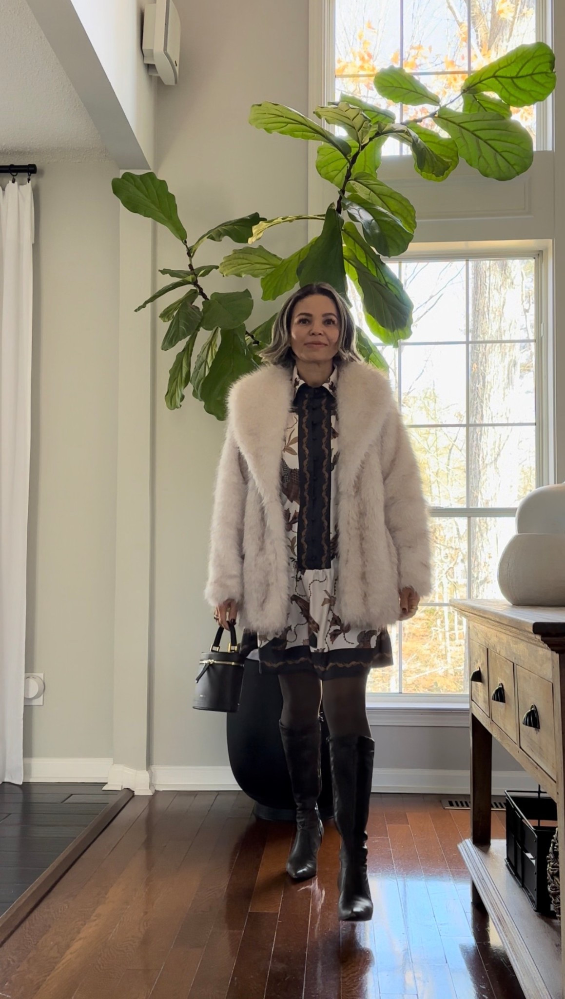 Winter outfit inspiration 
Floral dress paired with stockings, knee high boots, faux fur coat , chocolate brown bag! 

#LTKGiftGuide #LTKHoliday #LTKOver40