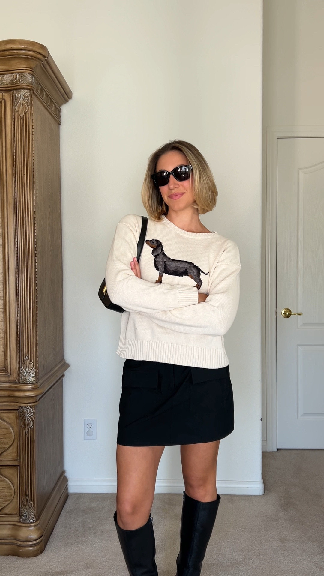 Winter outfit, winter style, sweater, Ralph Lauren sweater, dachshund sweater, black skirt, black mini skirt, black boots, heeled boots 

#LTKWatchNow #LTKSeasonal #LTKStyleTip