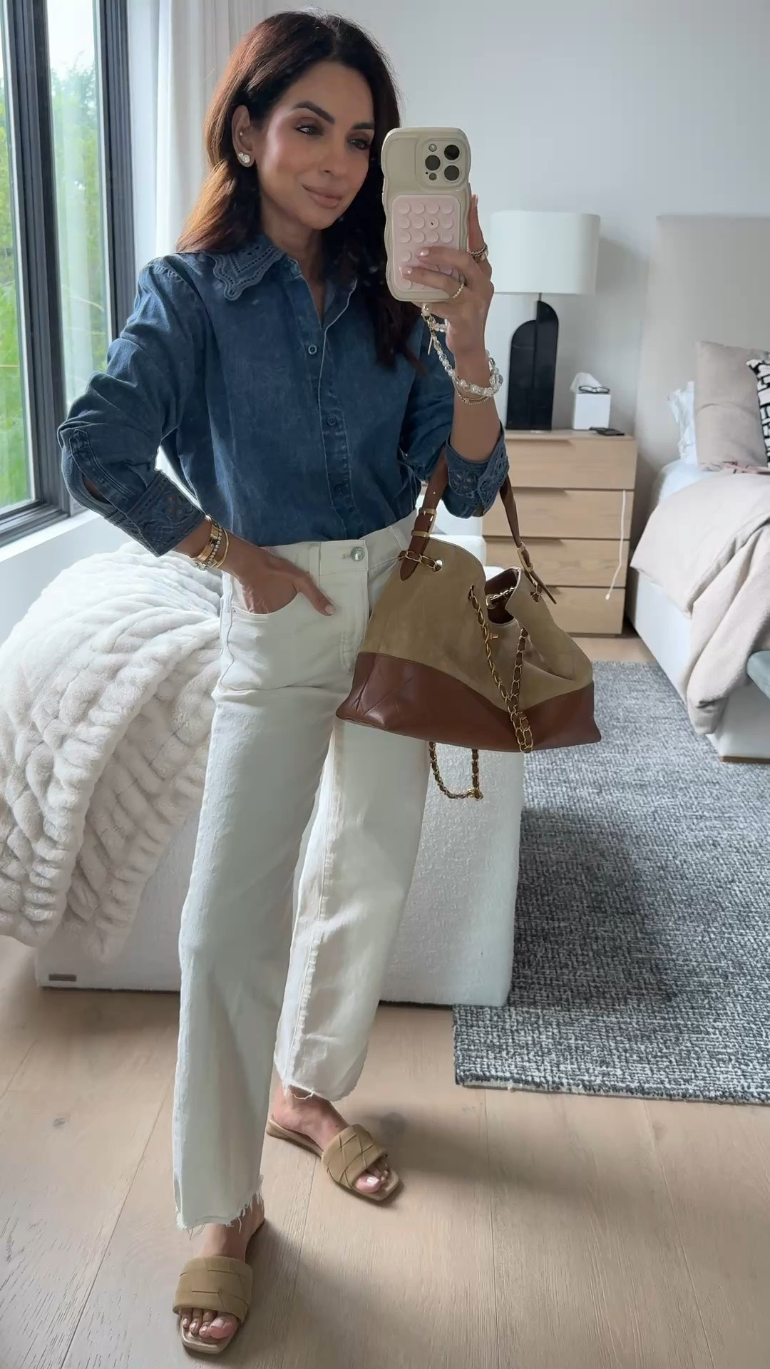 Classic look with my favorite off white jeans (run TTS I'm in 24 regular length) and this chambray top is the SOFTEST & I'm in my true size xs for reference!

#LTKSaleAlert #LTKWedding #LTKPetite