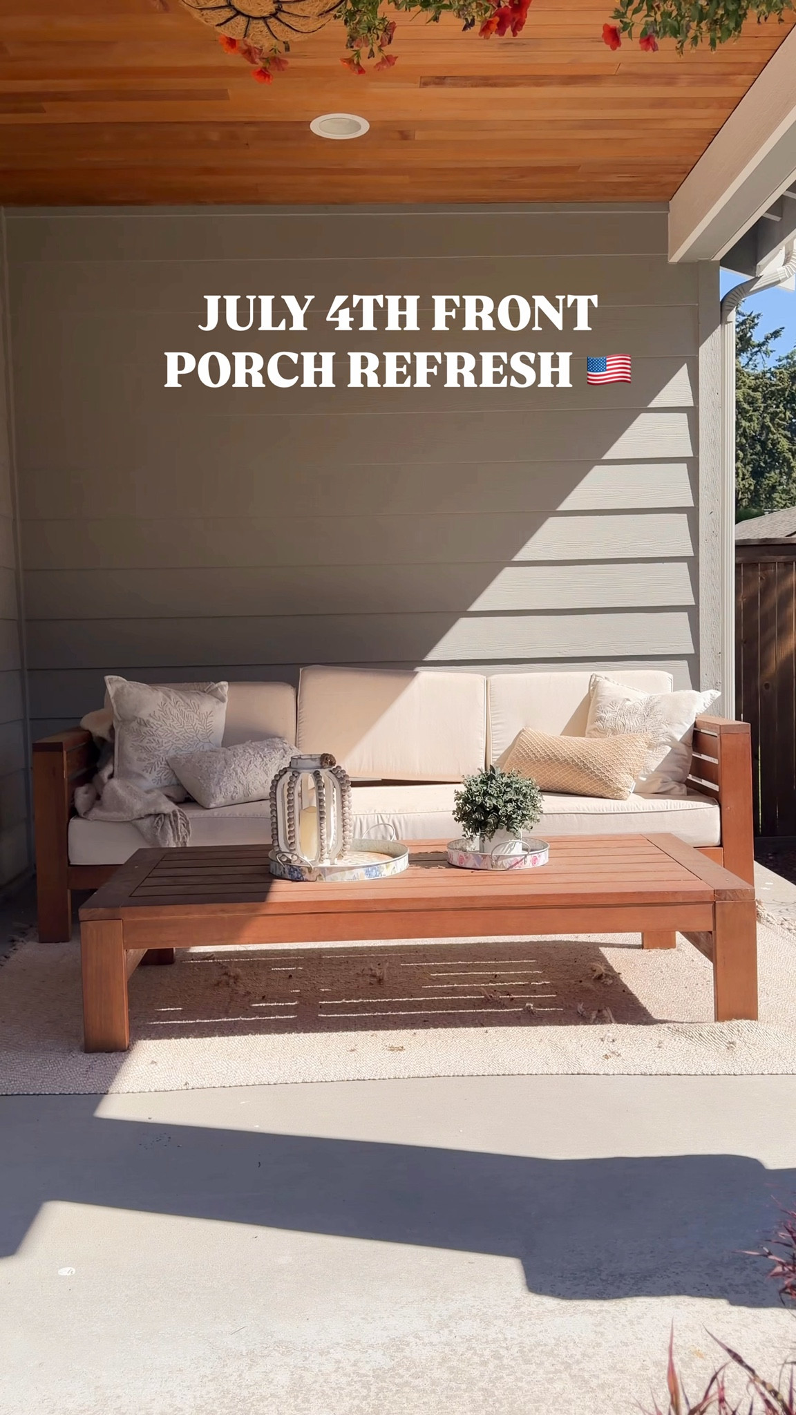 JULY 4TH FRONT PORCH REFRESH 🇺🇸 July 4th patriotic front porch outdoor furniture set up! USA American flag garland with fire pit patio table! 

Fire pit table, straws, plate, tray, pillows, rug, flag picks, bud vases, hanging basket, outdoor sofa, glasses, vases, hydrangeas, American Flag banner

#LTKsummer #LTKfestival #LTKhome