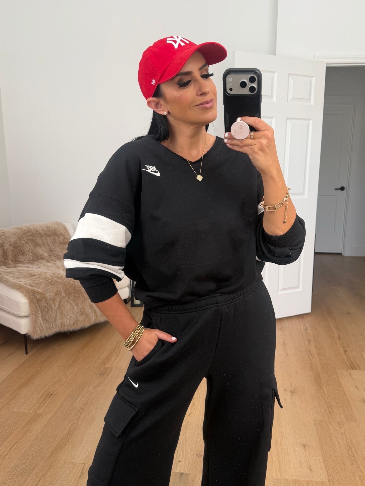 Woman’s Nike Sportswear Club Fleece. I’m wearing a size small.

Woman’s Nike Sportswear Phoenix Fleece cargo pants. I’m wearing a size small.