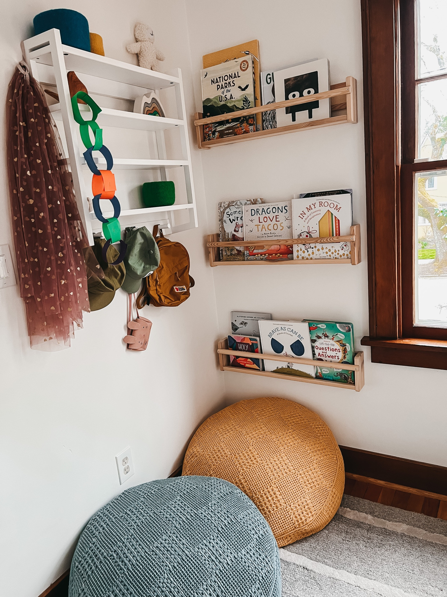 Reading corner in our playroom. These floor cushions get used all day long. White shelves are old from Crate & Kids. Wooden shelves are old IKEA. Linked lots of similar options  

#LTKkids #LTKfamily #LTKFind