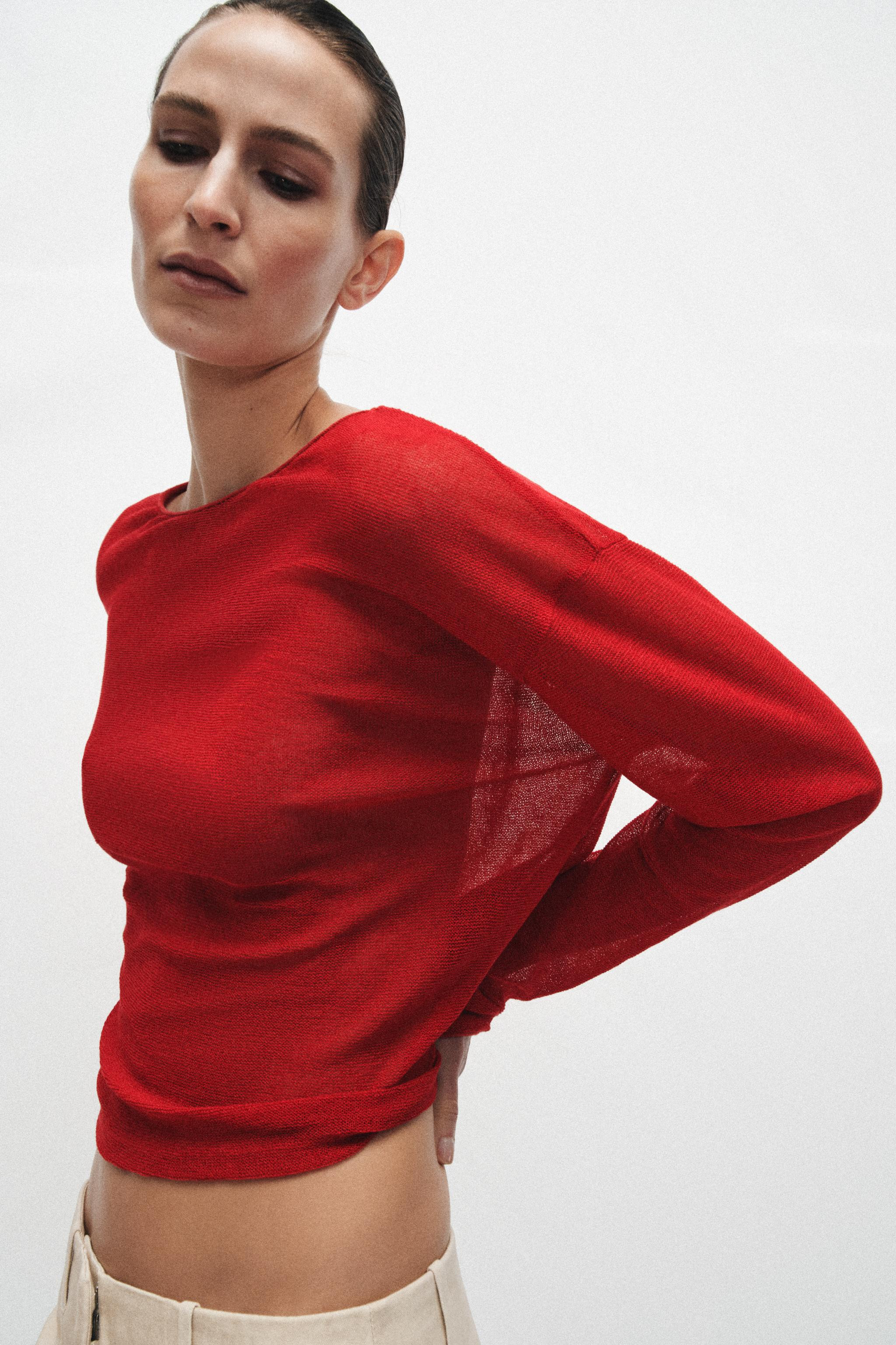 Round neck, long sleeve jumper. Openwork knit fabric. Straight hem. | Zara US