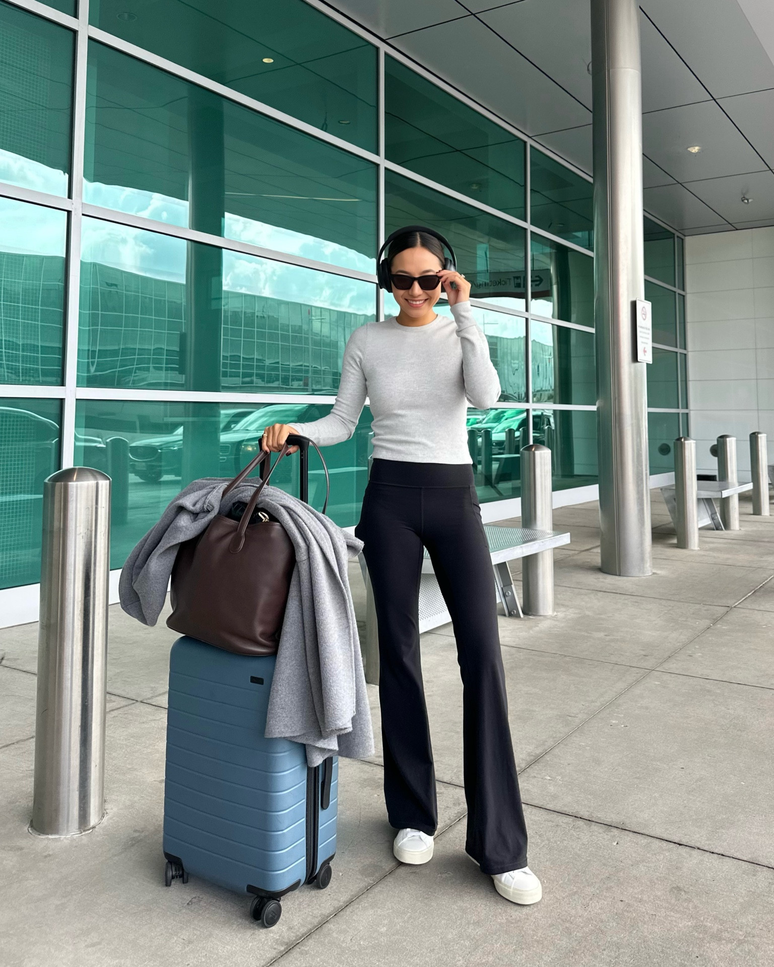 Simple travel outfit home! Suitcase is the bigger carry on from Away - such a quality suitcase! 

#LTKtravel #LTKCon #LTKstyletip