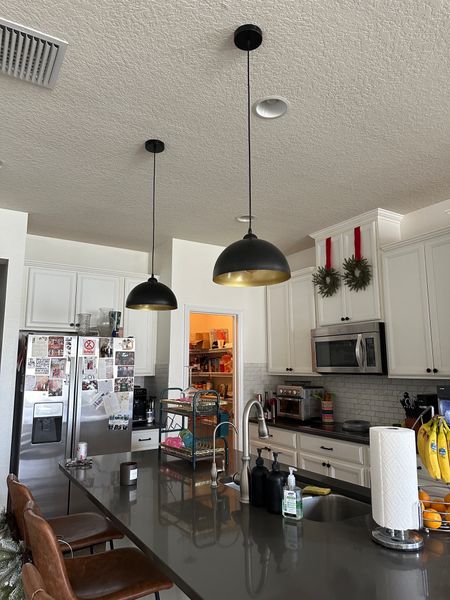 These modern black pendant lights are surprisingly affordable and completely change the vibe of a room! They're also on sale 

#LTKhome #LTKsalealert