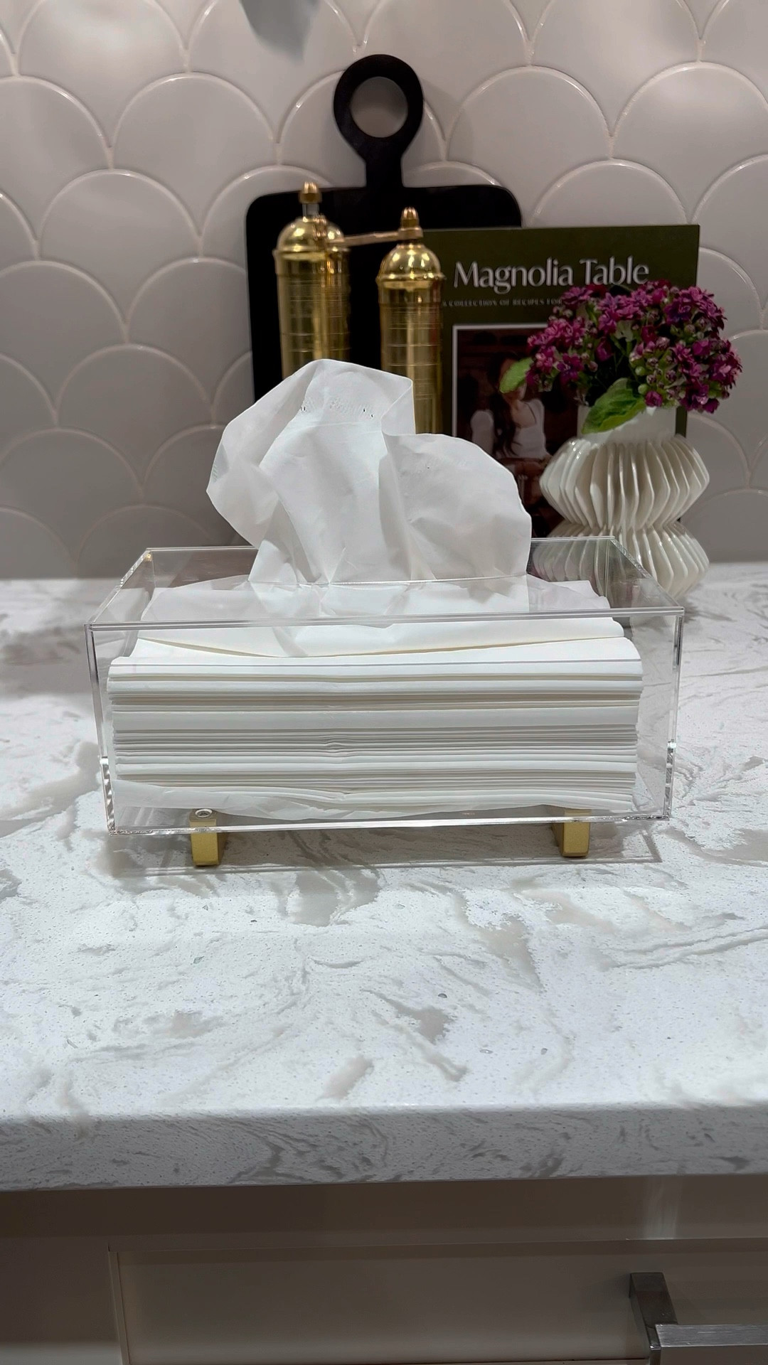 I’m absolutely smitten with this acrylic tissue paper holder! It brings such an elegant touch to any space. Style it in your bathroom, on a side table, or even as part of your countertop decor—it’s so versatile! 💕  

Kleenex holder 
Tissue holder 
Salt and pepper mill 
Wooden pedestal tray
Small white vase


Perfect for elevating your countertop styling game! ✨🛒

#LTKHome #LTKSaleAlert #LTKStyleTip