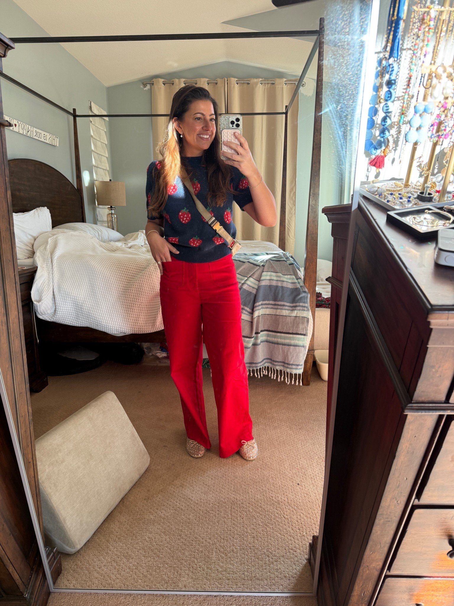 today’s outfit is giving strawberry shortcake grew up and started a mom group.

these red wide-leg jeans are bold in the best way and somehow make me feel instantly put-together even when my house looks like the aftermath of a toddler tornado. the strawberry knit top is so cheerful i’m basically wearing a good mood.

and the sparkly sandals said “we know you’re running errands but you still deserve glitter,” so obviously i listened.

sizing
5’3”
140 pounds
wearing small in the pants
top fits true to size - small
sandals fit true to size


strawberry sweater, red wide leg pants, colorful mom outfits, comfy cute outfits, strawberry shortcake vibes, bold color outfit inspo, casual mom uniform, playful mom style, bright outfit ideas, fun fall outfits

#LTKootd #LTKmomlife #LTKHoliday