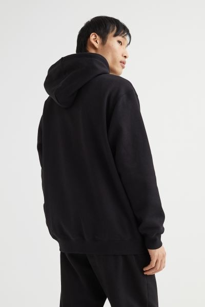 Relaxed Fit Hoodie - Black - Men | H&M GB | H&M (UK, MY, IN, SG, PH, TW, HK)