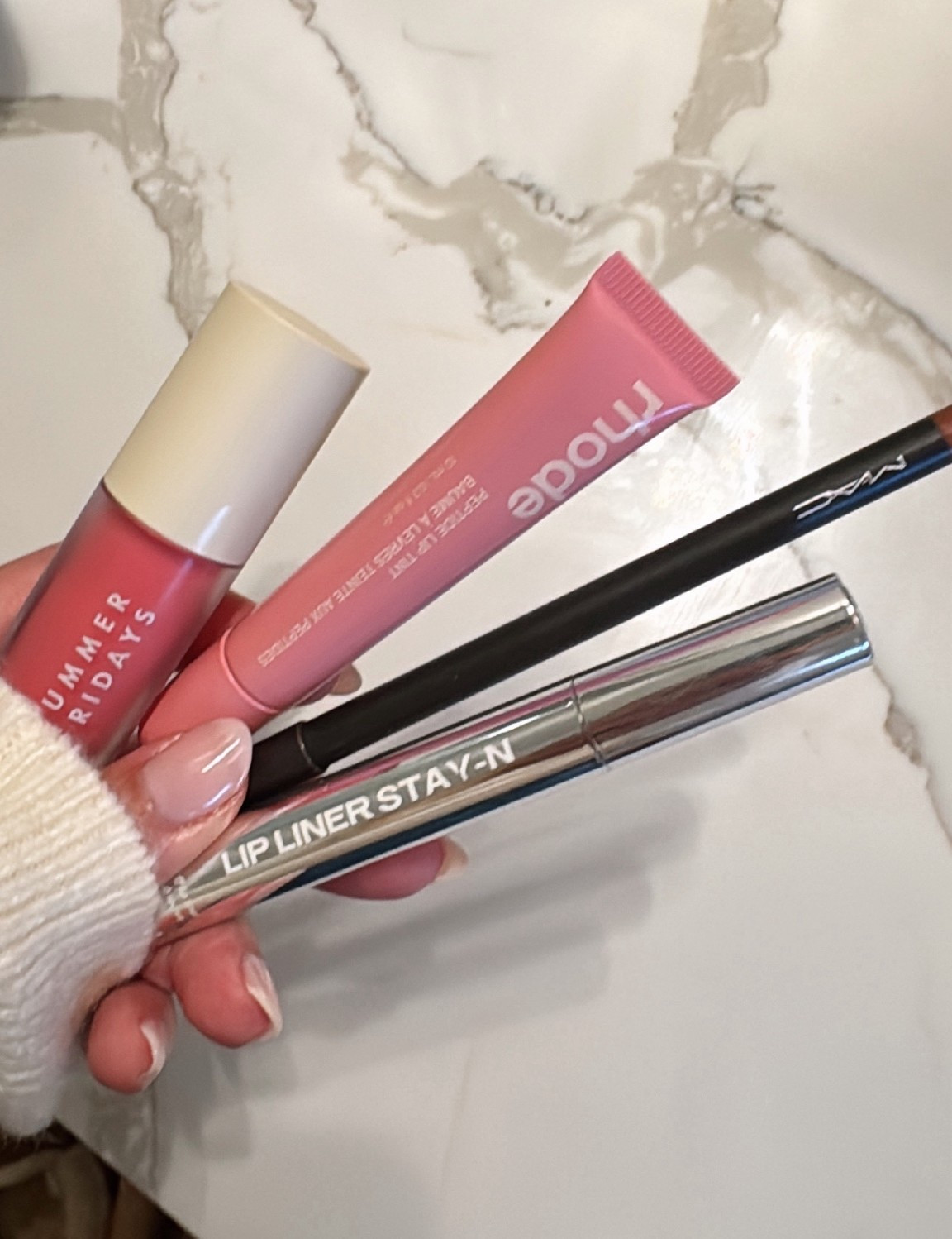 My go-to lip combo 💋✨
Lip liner stain first, then a MAC liner (pretty sure it was shade subculture), topped with Rhode lip tint in Ribbon 💄
Finished by tapping on Summer Fridays Dream Lip Oil in Pink Cloud for shine 💕!


Spring lip. Makeup. Lip color. Lip liner. Beauty. 

#LTKgrwm #LTKBeauty #LTKFindsUnder50