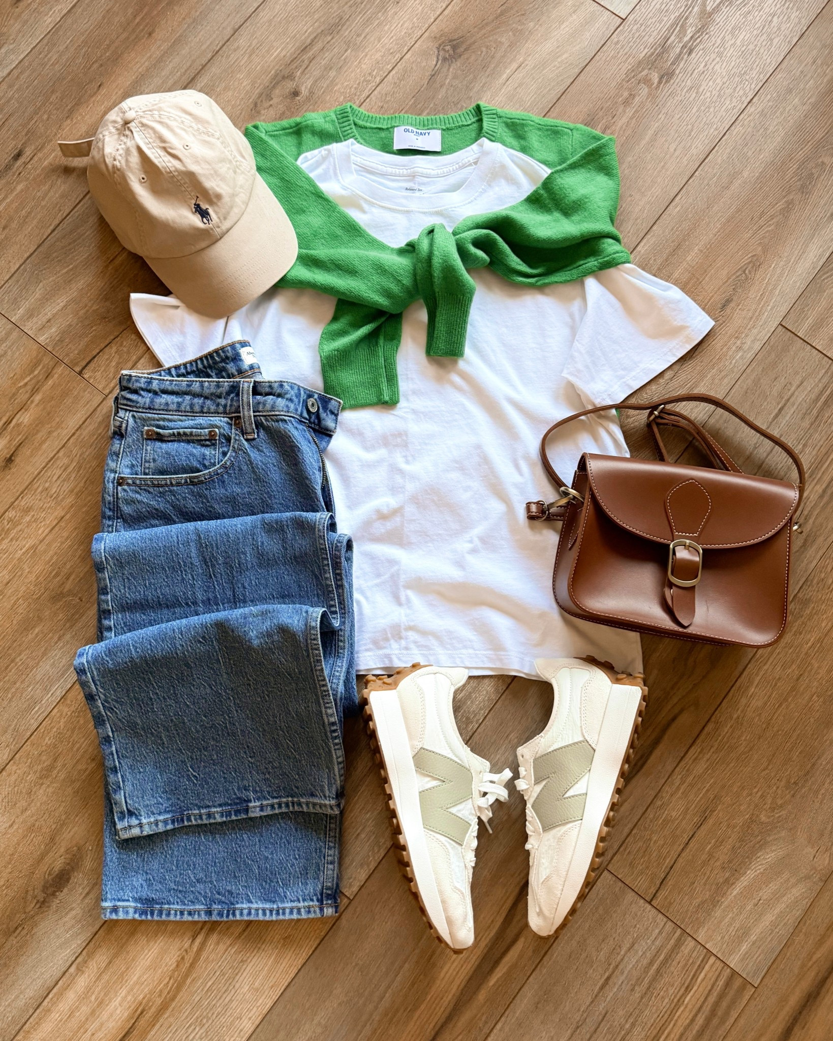 early spring outfits. abercrombie jeans. white t-shirt. cardigan over shoulders. 

#LTKdayinmylife #LTKSeasonal #LTKSaleAlert