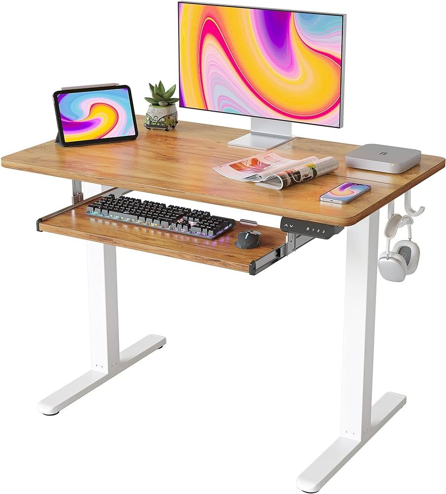 FEZIBO Standing Desk with Keyboard Tray, 40 × 24 Inches Electric Height Adjustable Desk, Sit Sta... | Amazon (US)