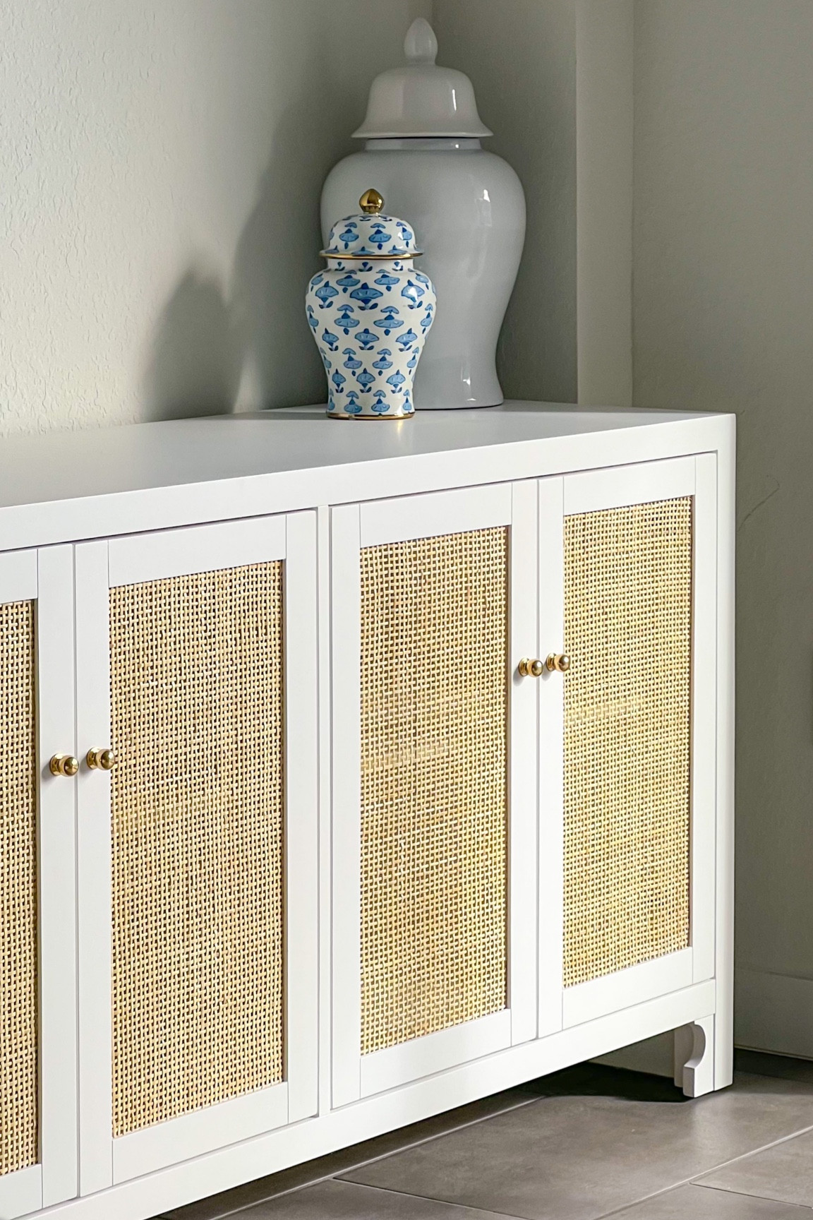 Rattan accent table, rattan console, ginger jars, blue and white ginger jars : coastal style 

#LTKSeasonal #LTKunder100 #LTKhome