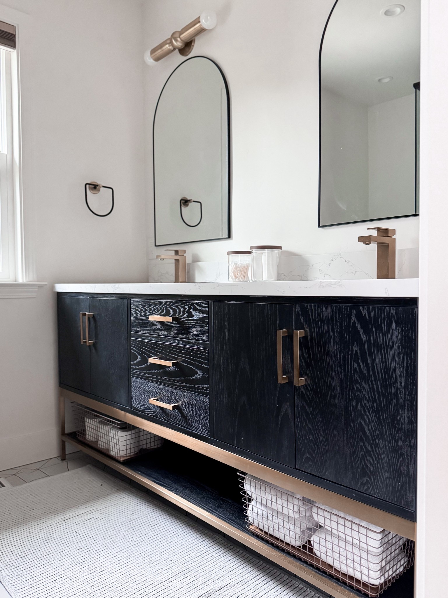 Patience is important when it comes to finding just the right storage items … and especially when you have an open, visible space you’re working with. This bathroom has an open shelf under the vanity and I found the perfect basket, but it took some time. These not only fit perfectly … they are the same color as the vanity details as well. LOVE! Video coming soon!

#LTKHome