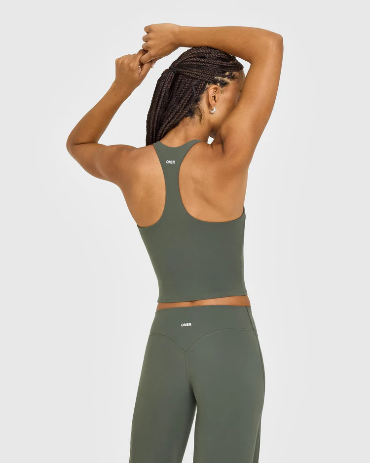 SoftMotion™ Racer Back Mid Vest with Built in Bra Shelf with White Logo 
 Dark Khaki | Oner Active (UK / US)