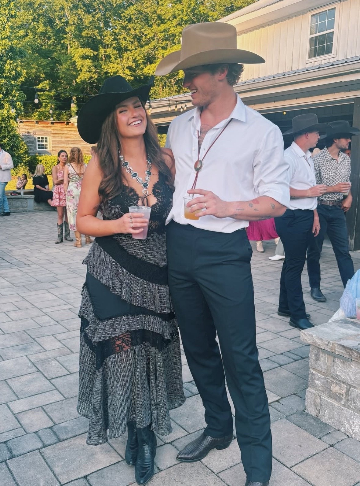 Western Wedding Guest Vibes 🤠✨
Wore this ruffled lace-trim midi dress to a country wedding and got so many compliments! The layered detail, lace peekaboo, and flirty fit make it perfect for a summer wedding, barn party, or anything with a western flair. Paired it with black cowboy boots, a statement squash blossom necklace, and of course — a wide-brim hat. Linking this exact dress + similar western-chic pieces!

#WesternStyle #WeddingGuestDress #CountryWeddingOutfit #CowgirlChic #LTKStyle #BohoDress #RuffleDress #CowgirlGlam #WesternWeddingGuest #BarnWeddingLook #LTKWedding #LTKSeasonalStyle #RevolveStyle #WesternFashion