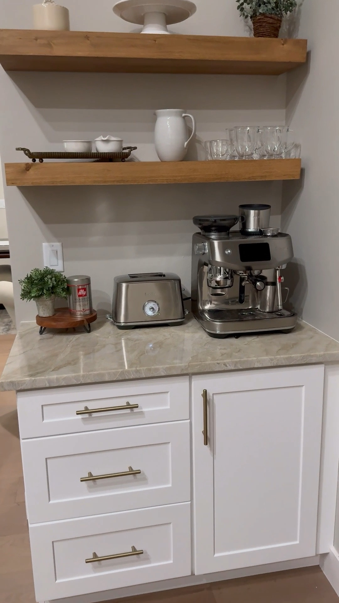 Love my coffee station!  Breville espresso machine, white oak shelves, kitchen decor, coffee decor 

#LTKHome #LTKSeasonal #LTKdayinmylife
